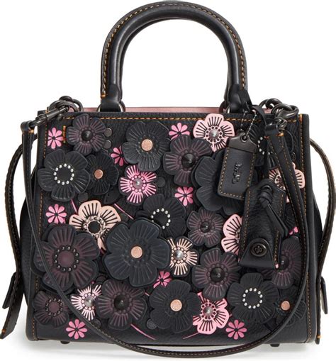 coach rogue tea rose bag.